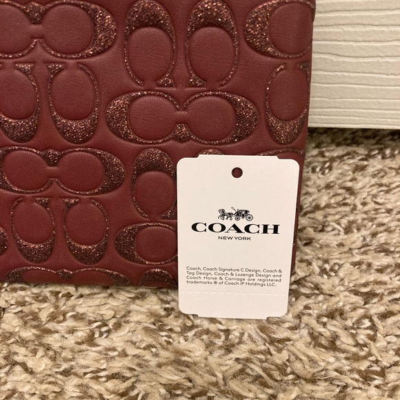 Like new, Coach wristlet - Picture 7 of 7